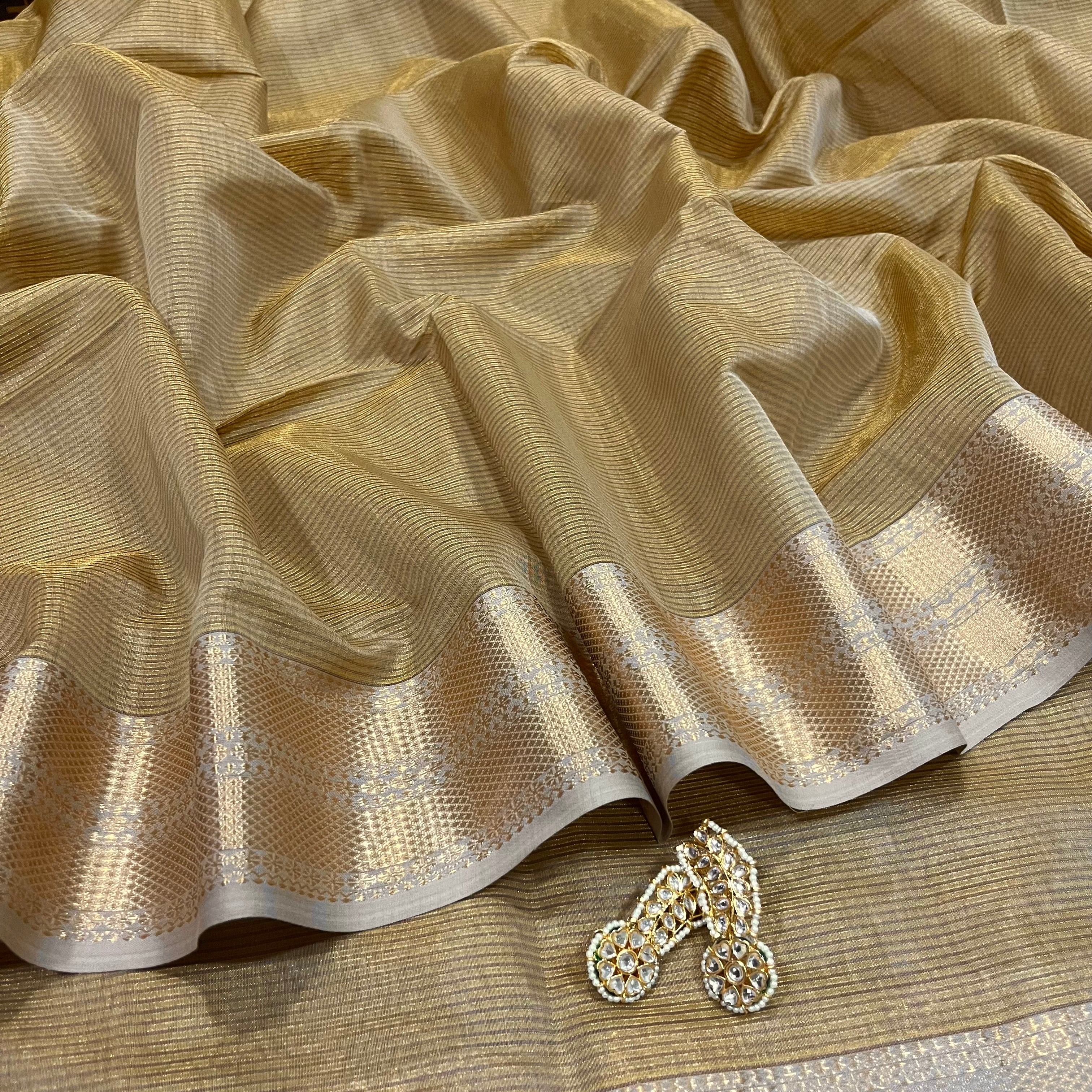 Beige Maheshwari saree with zari checks all over