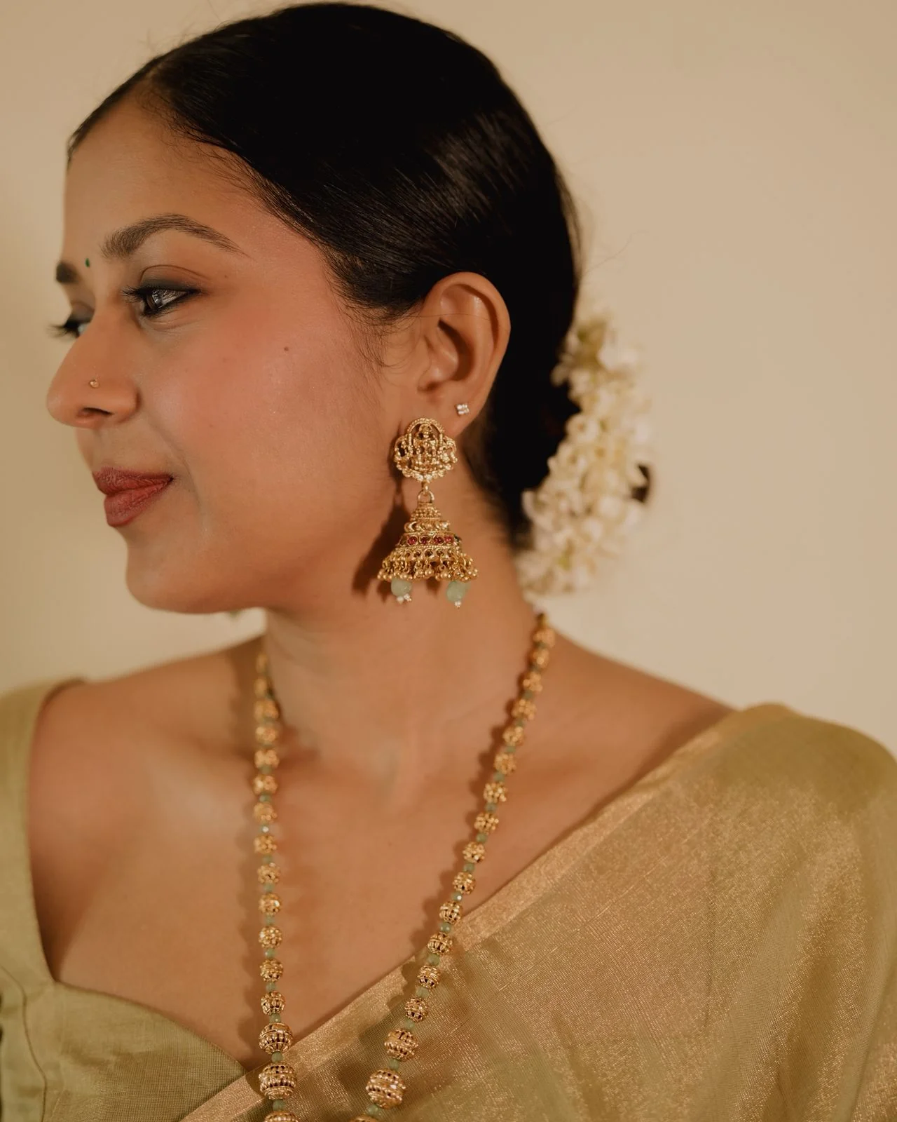 Olive gold Maheshwari tissue silk saree with zari bootis all over - Image 9