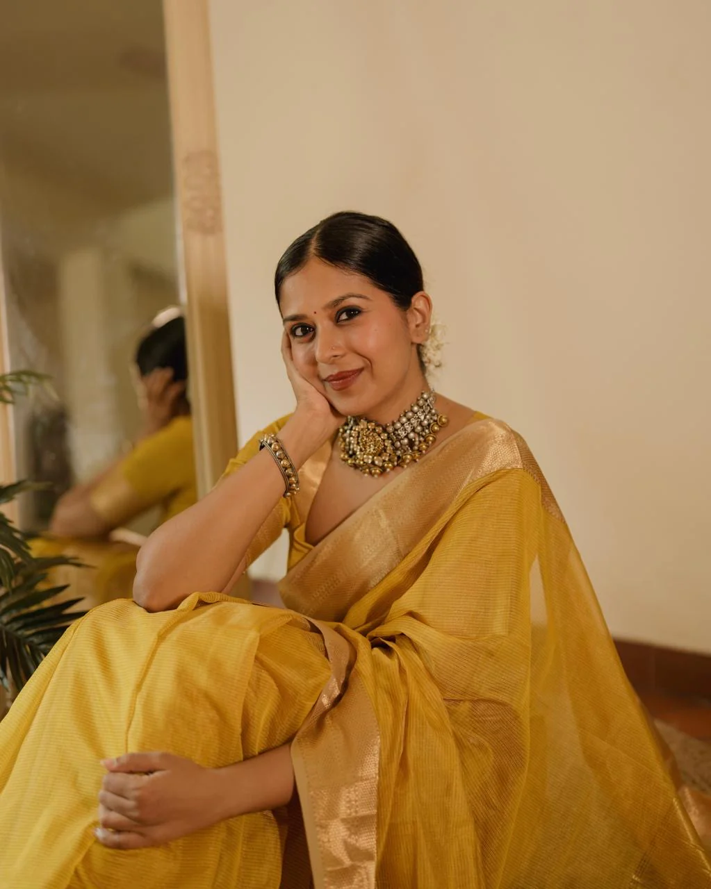 Yellow Maheshwari saree with zari lines all over